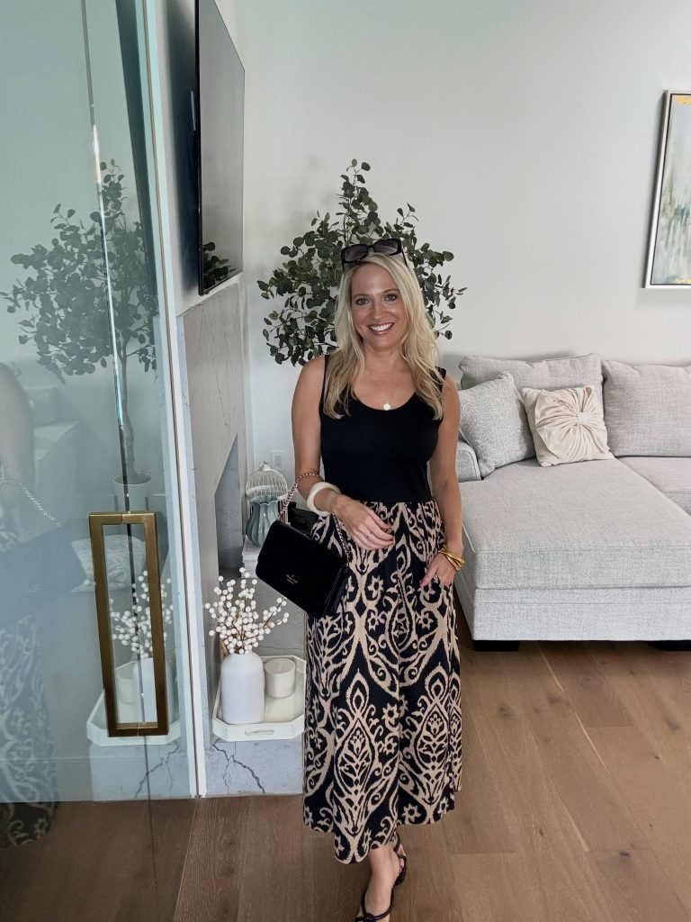 A Black Tank with a Patterned Midi Skirt for Easy Statement Dressing