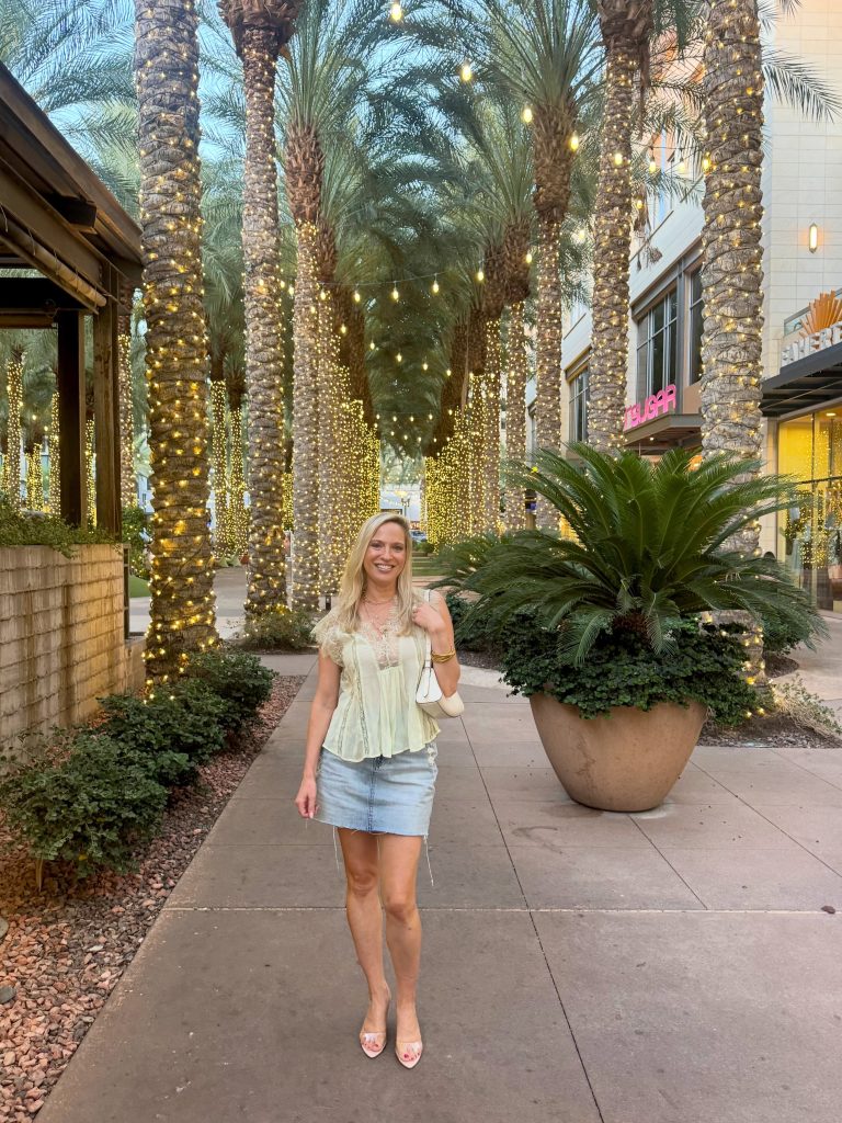 A Mint Peplum Top with a Denim Skirt for Casual Feminine Style